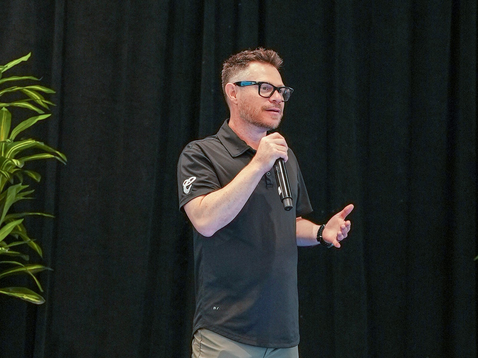 Jason Smylie speaking on stage